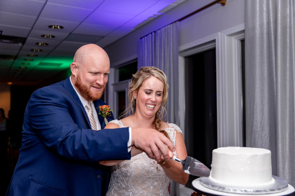 cake cutting at a greate bay country club wedding