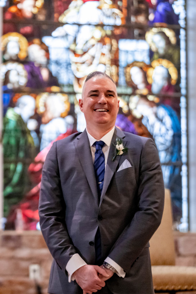 groom seeing his bride walk down the aisle during a philadelphia wedding ceremony