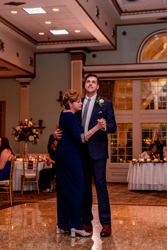parent dances during a wedding reception at mendenhall inn