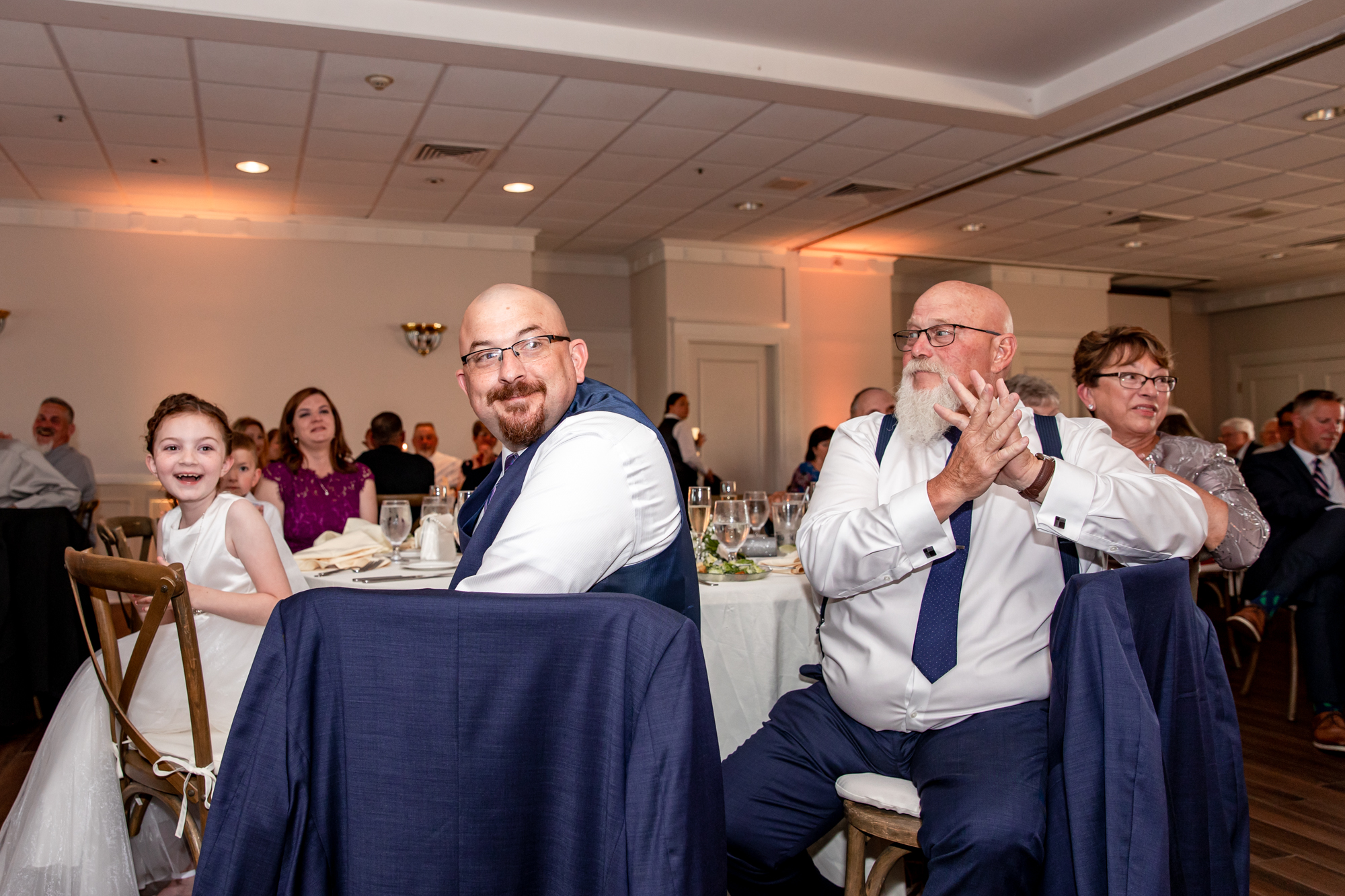 toasts at a brookside country club wedding reception