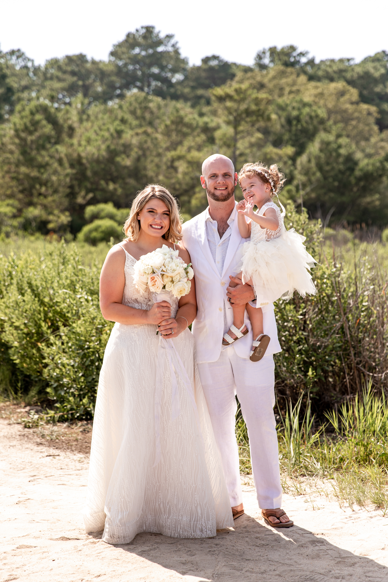family portraits after a beach wedding