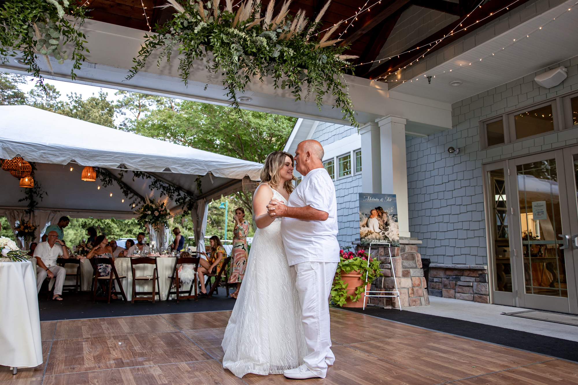 father daughter dance at a private beach wedding reception