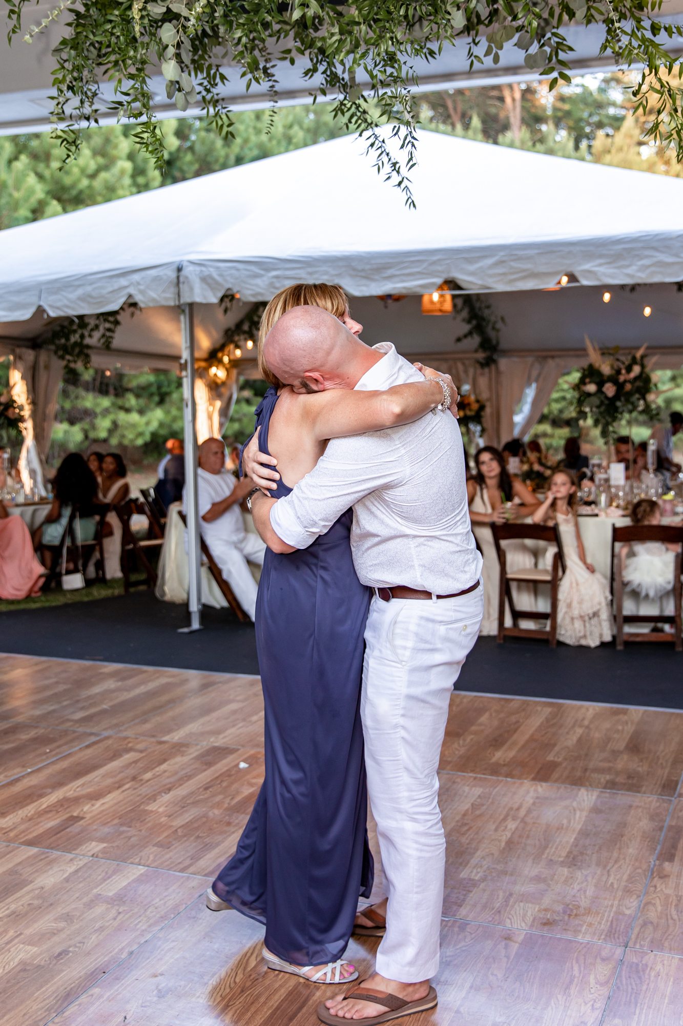 mother son dance at a private beach wedding reception