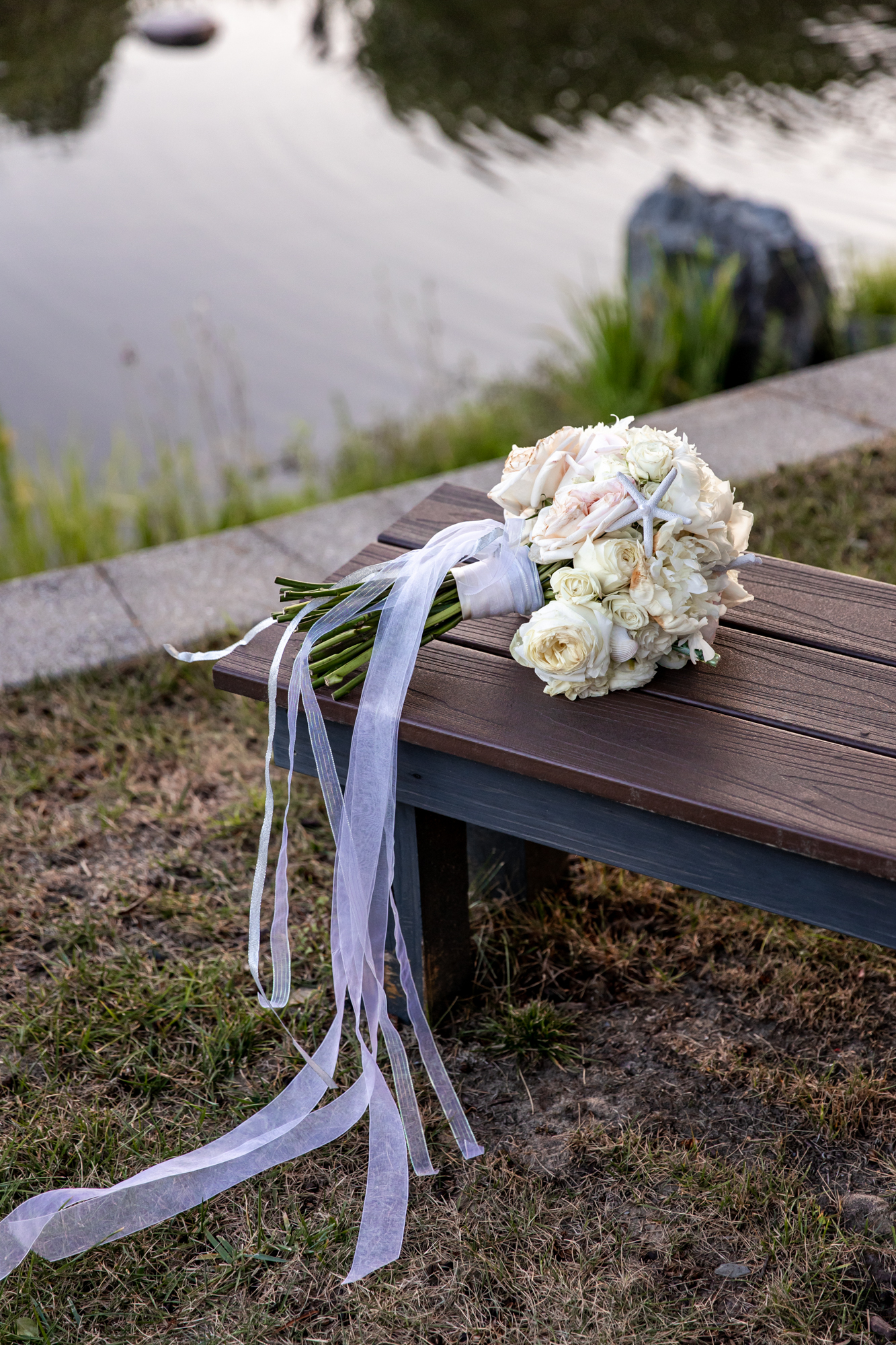 bridal bouquet sunset portraits at a private rehoboth beach wedding reception