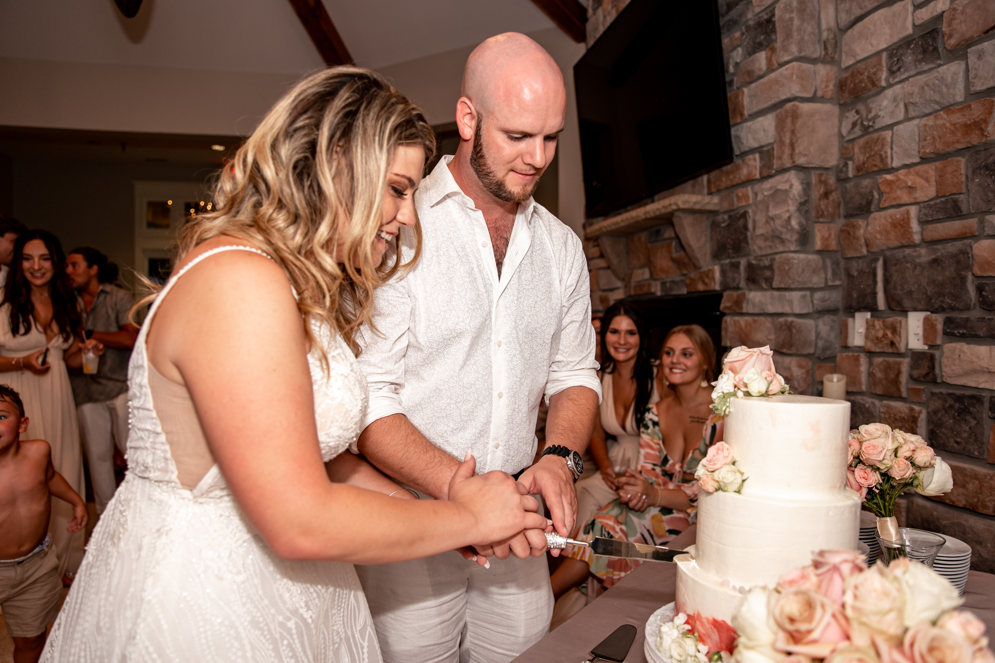 cake cutting at a rehoboth beach wedding reception
