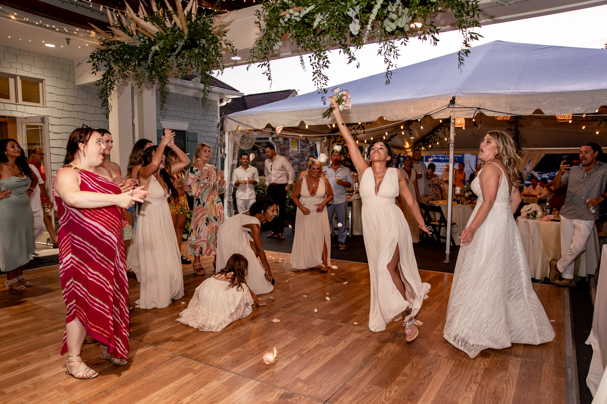 bouquet toss at a rehoboth beach wedding reception