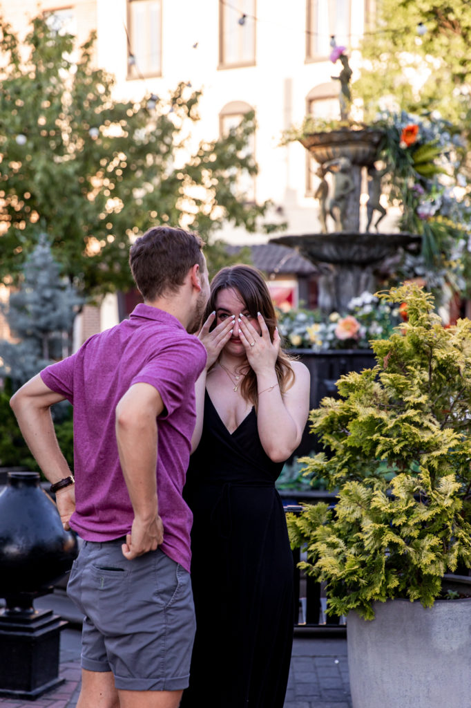 celebrating after a proposal in front of the singing fountain in south philly