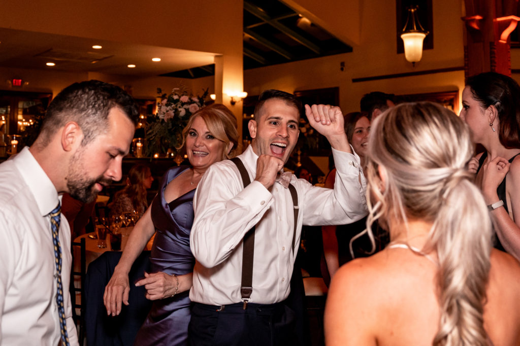 guests dancing at a knowlton mansion wedding reception