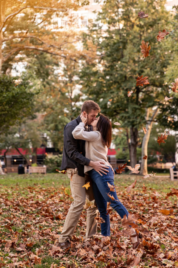 a couples poses for photos at washington square park in old city philadelphia