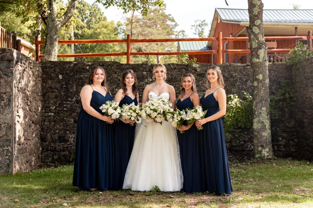 bridal party portraits at trout lake in the poconos