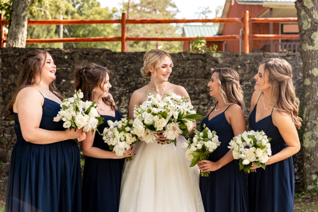 bridal party portraits at trout lake in the poconos
