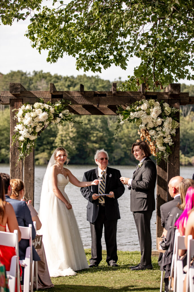 outdoor wedding ceremony at trout lake in the poconos