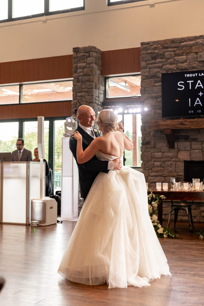 emotional father daughter dance at a trout lake wedding reception