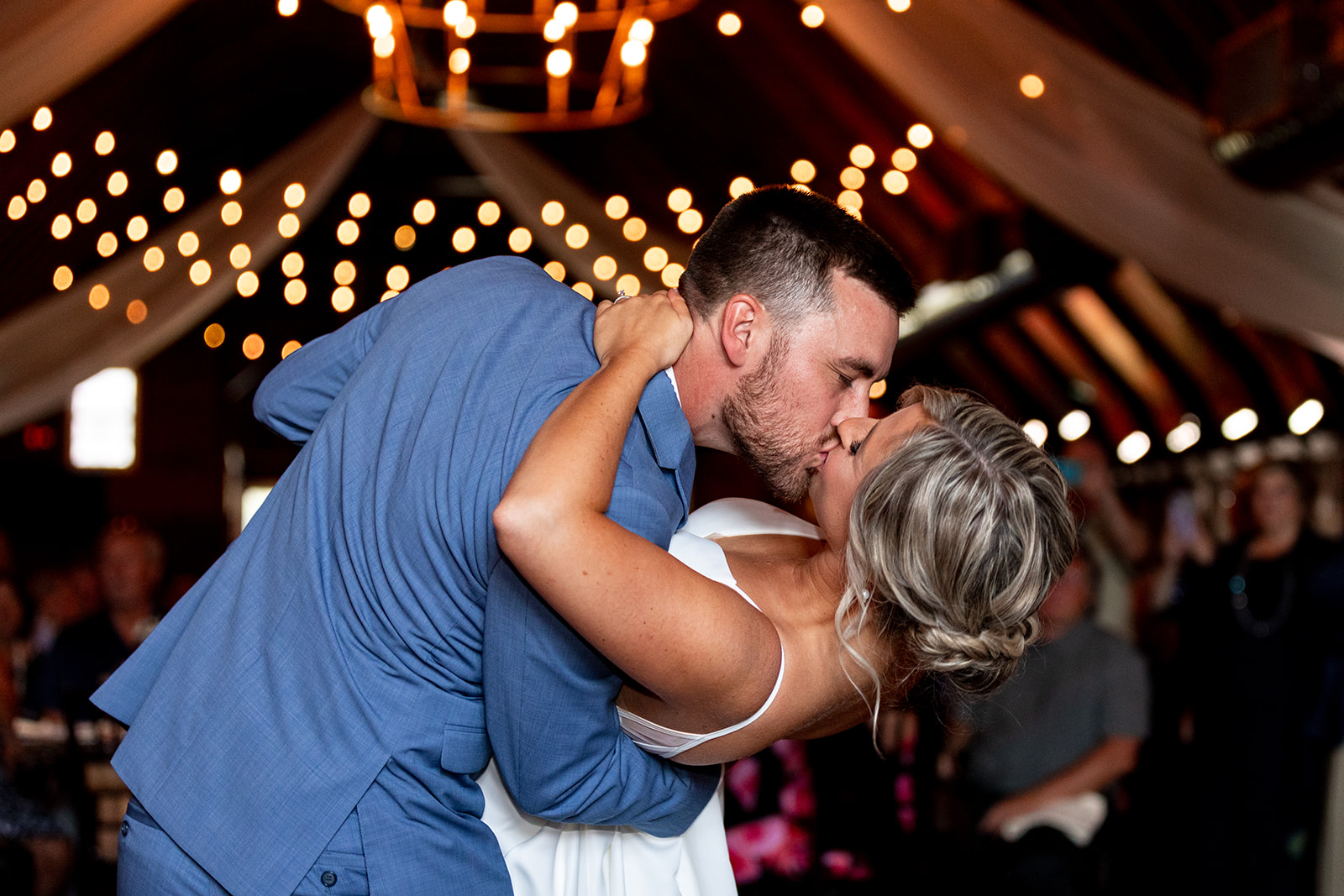 bride and groom first dance dip kiss photo at perona farms wedding venue in new jersey