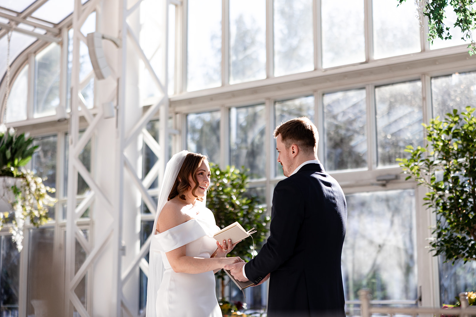 A bride and groom share private vows at The Madison Hotel in New Jersey before their courthouse elopement.